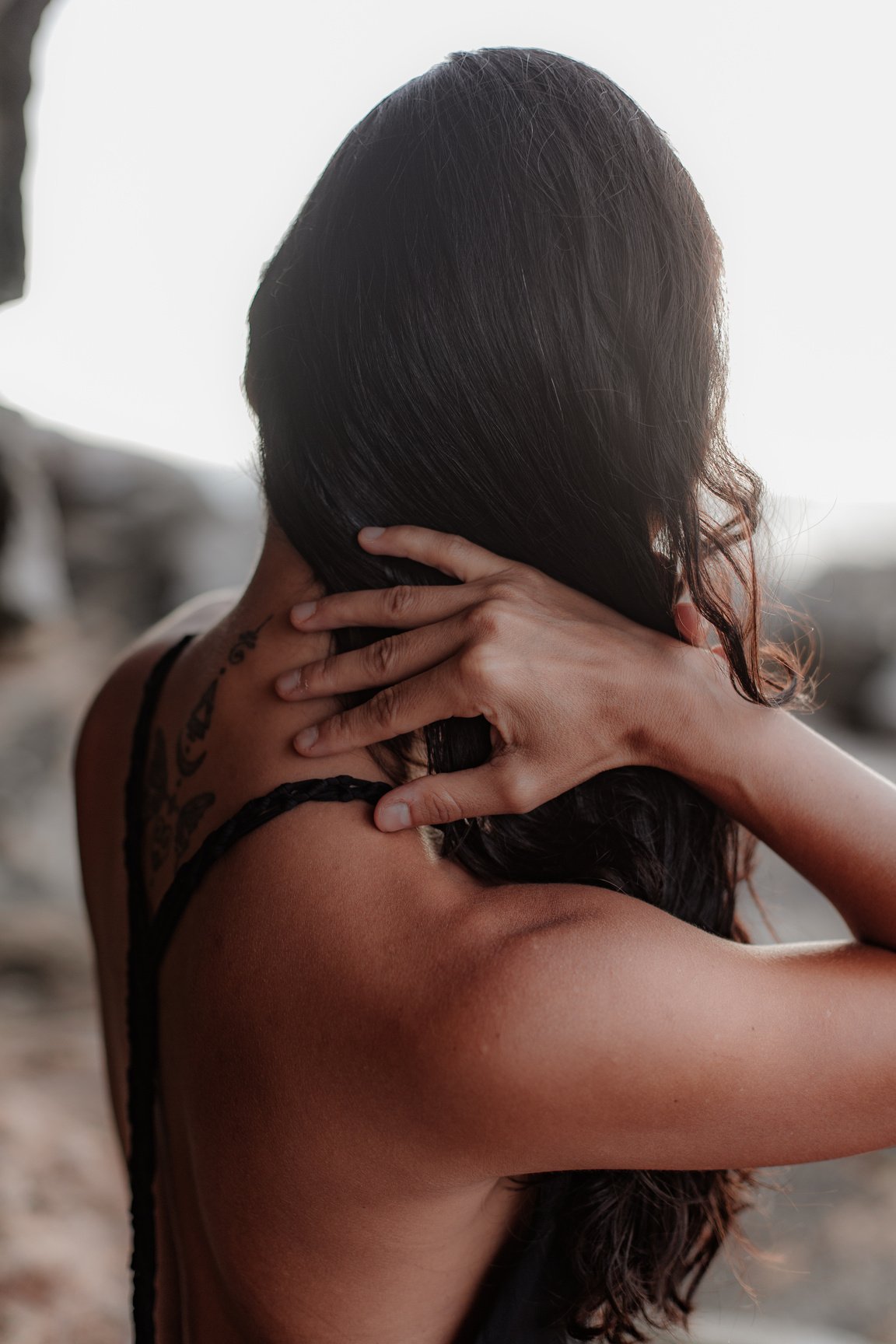 Woman Wearing Black Racer Back Top